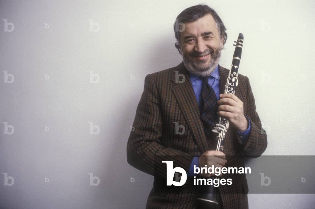 Italian movie director Pupi Avati playing the clarinet (1991) (photo)