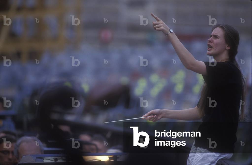 Sferisterio in Macerata, 1991. Italian conductor Elisabetta Maschio performing a rehearsal/Sferisterio di Macerata 1991. Il direttore d'orchestra Elisabetta Maschio conducts a prova-