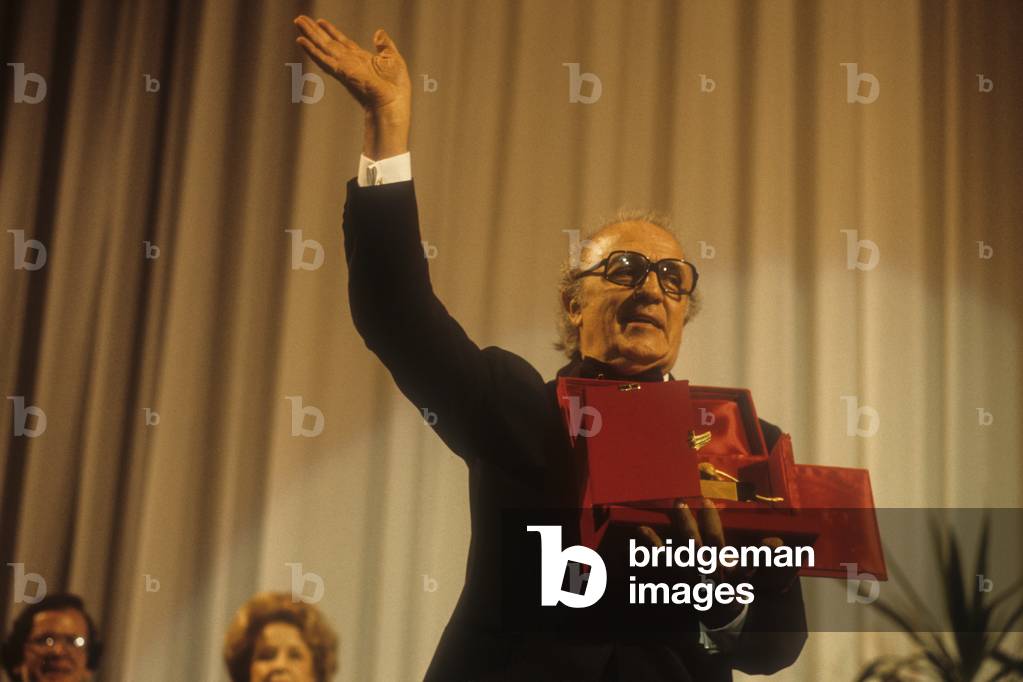 Venice Film Festival 1985. Italian director Federico Fellini receiving the Golden Lion award for life achievements (photo)