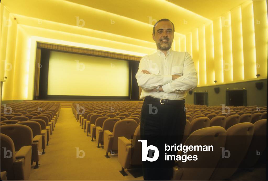 Venice Lido, 1999. Venice Film Festival director Alberto Barbera in the Sala Grande (great hall) of the Cinema Palace (photo)