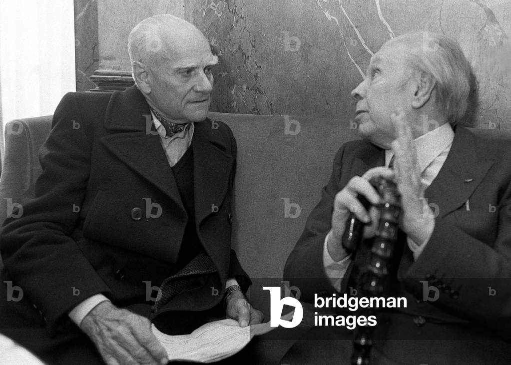 Portrait of Argentine writer Jorge Luis Borges with Italian writer Alberto Moravia in Rome, 1981.