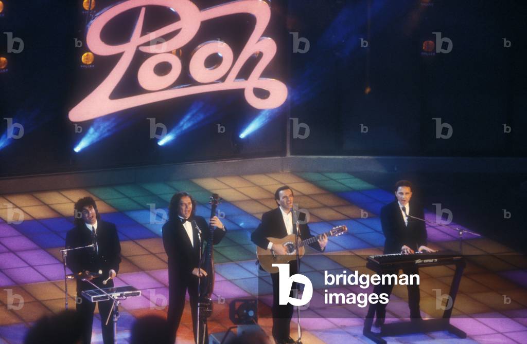 Italian pop group The Pooh: Stefano D'Orazio, Red Canzian, Dodi Battaglia, Roby Facchinetti (about 1987) (photo)