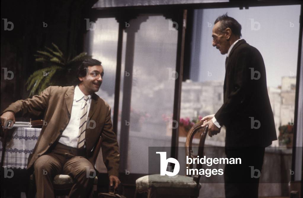 Rome, Quirino Theater, 1981. Italian playwright Eduardo De Filippo, with his son Luca, acting in the play written by himself 