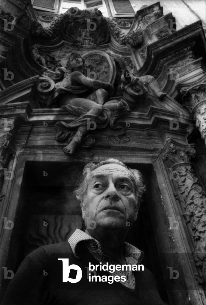 Rome, 1979 Painter Renato Guttuso in front of the door of his house at Palazzo del Grillo