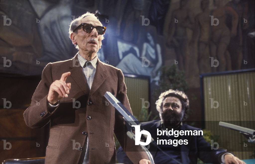 Rome, 1981. Italian playwright and actor Eduardo De Filippo giving a lecture at La Sapienza University (on his right Ferruccio Marotti, director of Ateneo Theater) (photo)