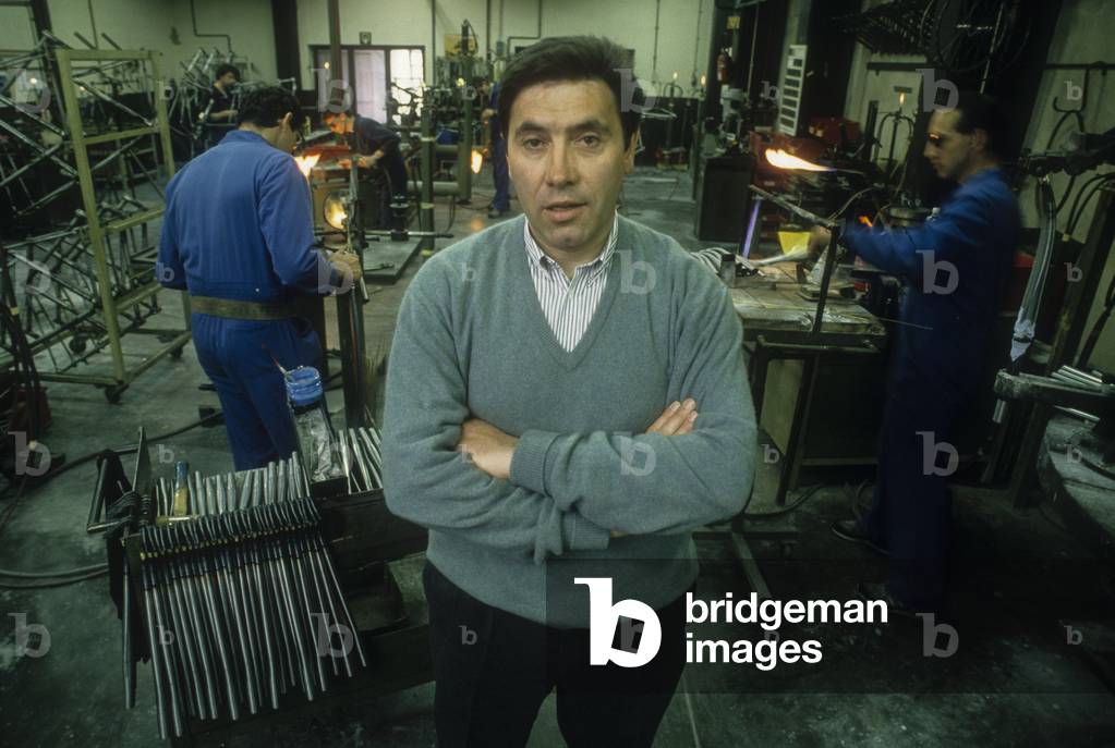Brussels, 1990. Former cycling champion Eddy Merckx in his bicycle factory/Brussels, 1990. L'ex campione di ciclismo Eddy Merckx nella sua fabbrica di biciclette -