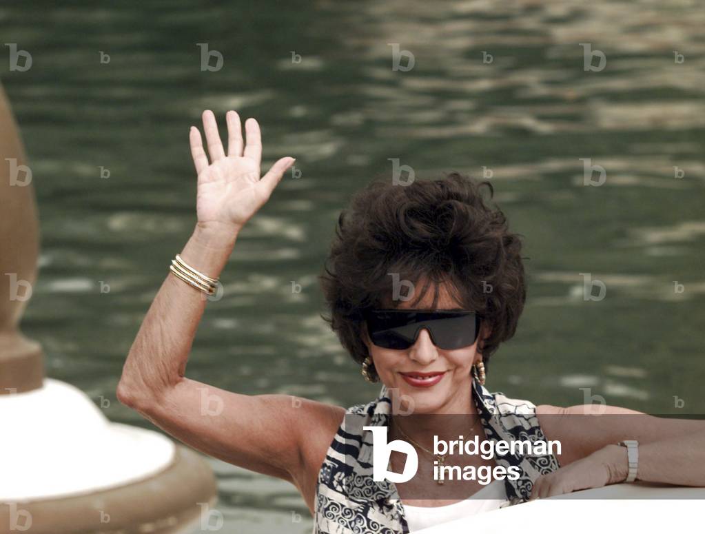 Joan Collins arriving at the 52nd Venice Film Festival 1995. The first reportage, realized in Italy, using a digital camera (Canon EOS DCS3)