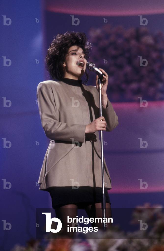 Sanremo Music Festival 1991. Italian pop singer Mietta performing her song 