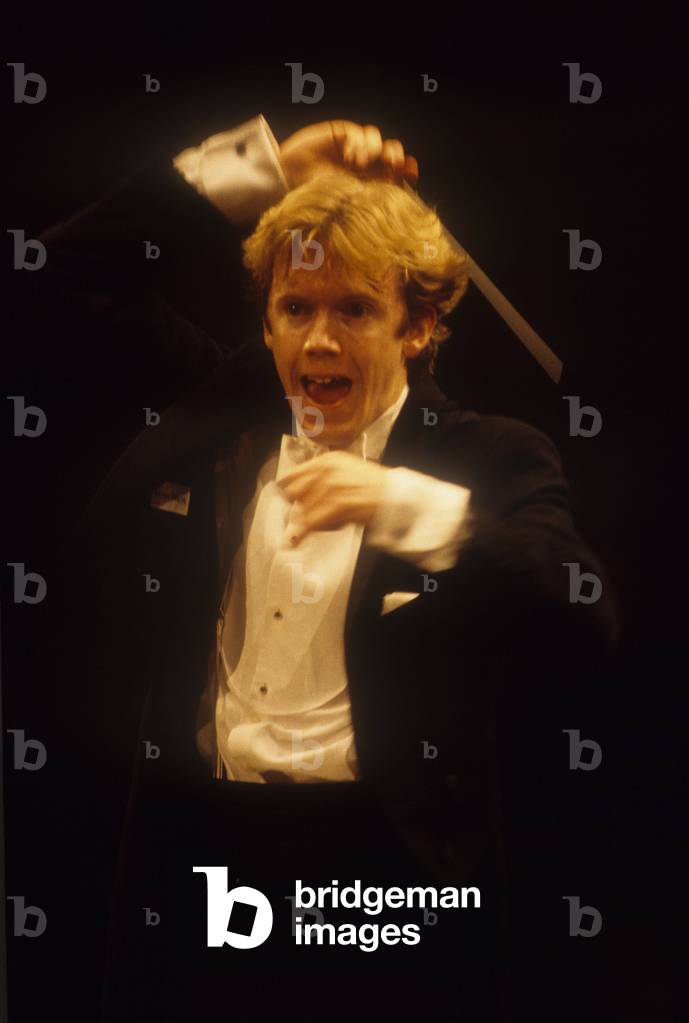 Milan, Piccolo Theater, 1999. British conductor Daniel Harding performing/Milano, Piccolo Teatro, 1999. Daniel Harding mentre directs -
