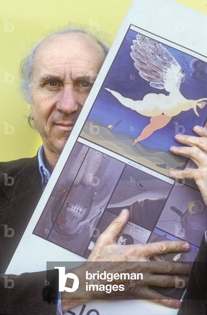 Lucca, 1984. Italian cartoonist Renato Calligaro holding one of his comics