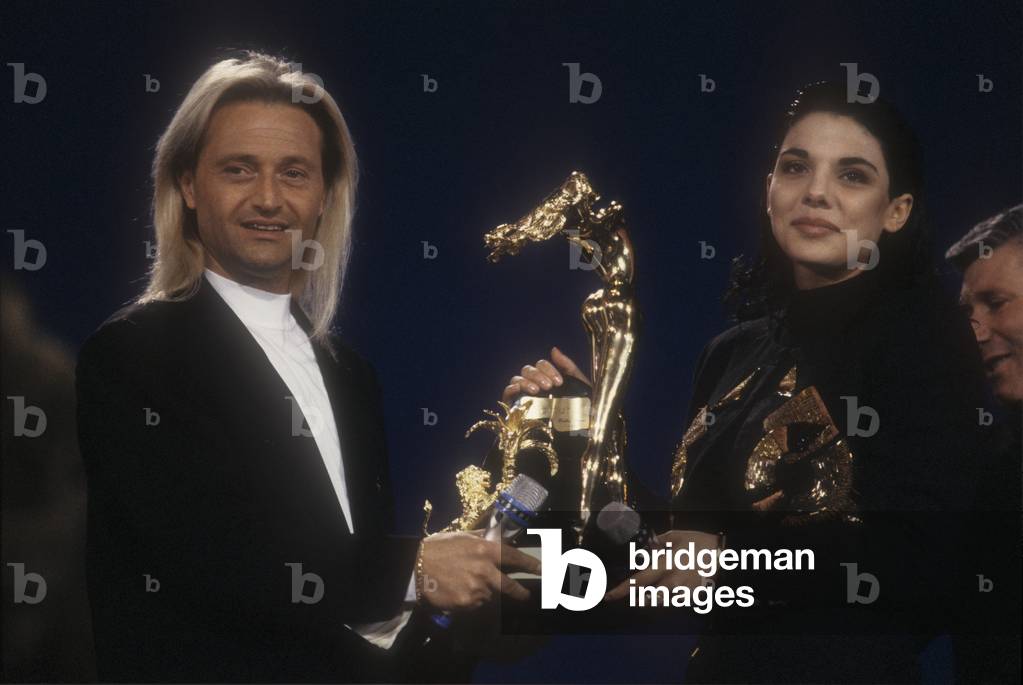 Sanremo Music Festival 1990. Italian pop singers Amedeo Minghi and Mietta, winners of the Festival for the song 