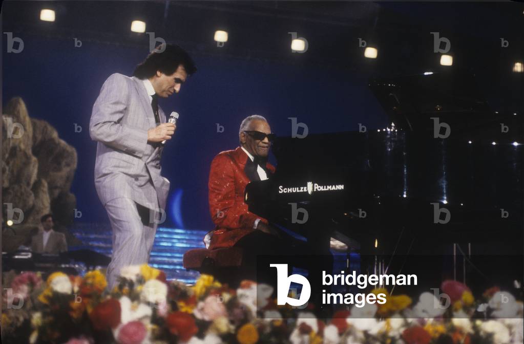 Sanremo Music Festival 1990. Italian pop singer Toto Cutugno performing with ray Charles the song 