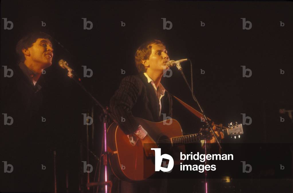 Italian pop singers Gianni Morandi and Ron, about 1990 (photo)