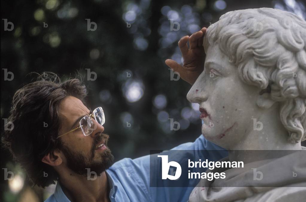Rome, about 1990. Italian writer Luciano Allamprese and a bust of philosopher Giordano Bruno (photo)
