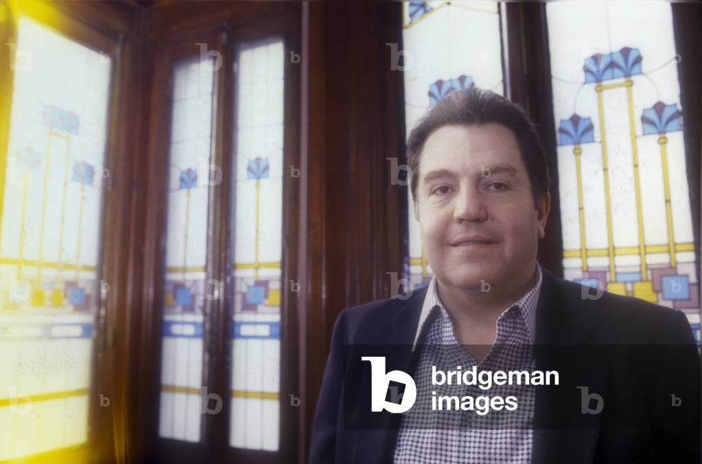 Milan, 1980. Italian writer Giuseppe Pontiggia in his house (photo)