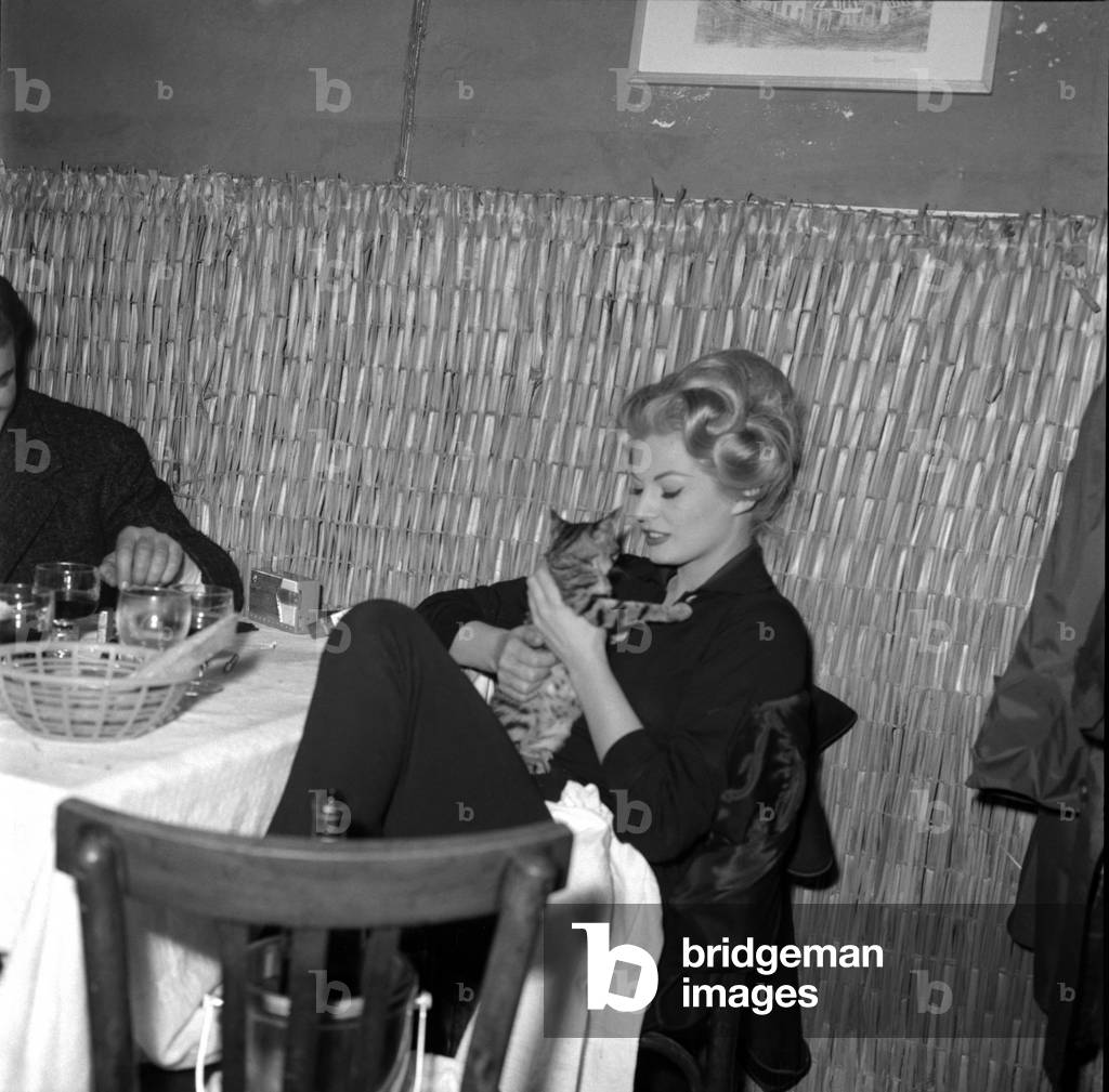 Anita Ekberg with a cat
