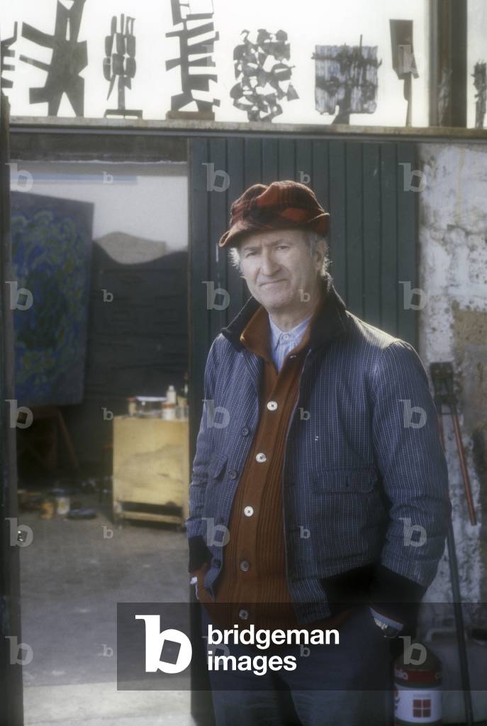 Rome, 1980. Italian artist Pietro Consagra in his studio