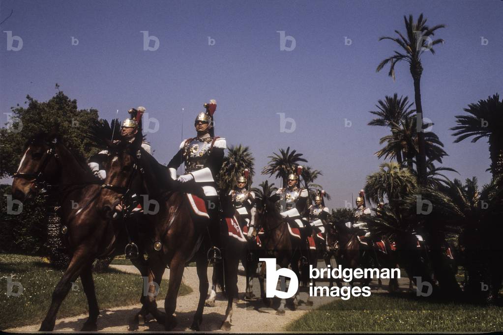 Rome, 1985. Cuirassier on horseback in the gardens of the Quirinale Palace, seat of the President of the Italian Republic, of which they are the honor guard