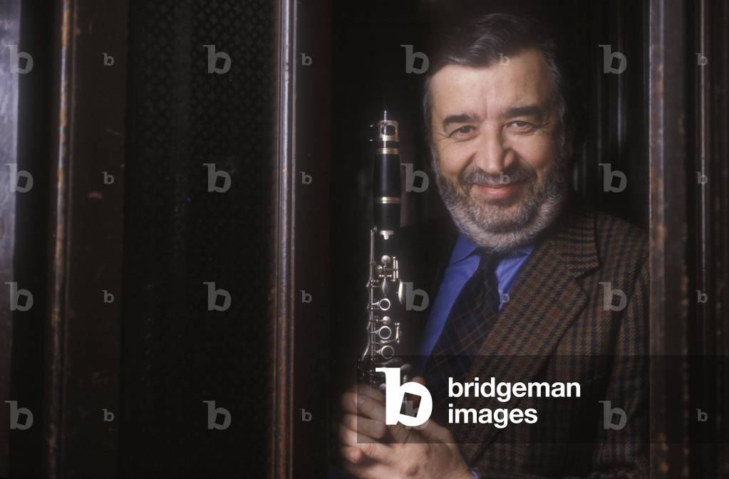 Italian movie director Pupi Avati playing the clarinet (1991) (photo)