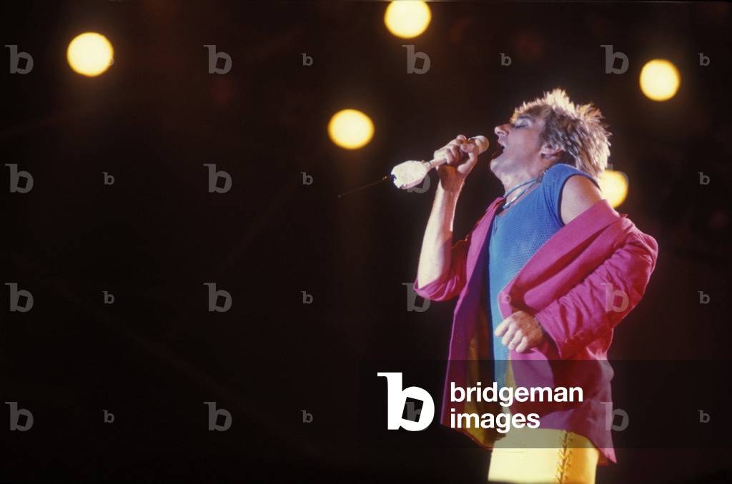 Portrait of rock singer Rod Stewart on stage in 1990.