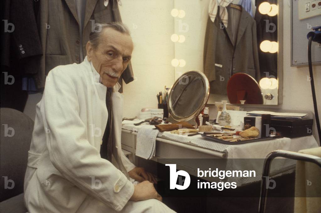 Milan, Teatro Manzoni, about 1980. Italian playwright and actor Eduardo De Filippo in his dressing room before a show (photo)