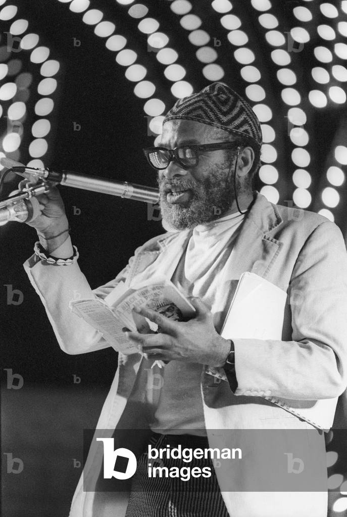 Rome, Piazza di Siena, 1980. American Jazz poet Ted Joans at econd Festival of poets/Roma, piazza di Siena, 1980. Il poeta e trombettista jazz Ted Joans al Secondo Festival dei Poeti -