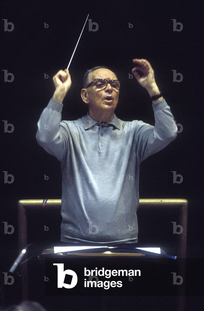Rome, Pius XII Auditorium, 7-11-1998. Italian composer Ennio Morricone conducting a rehearsal/Roma, Auditorium Pio XII, 7-11-1998. Il compositore Ennio Morricone mentre directs una prova -