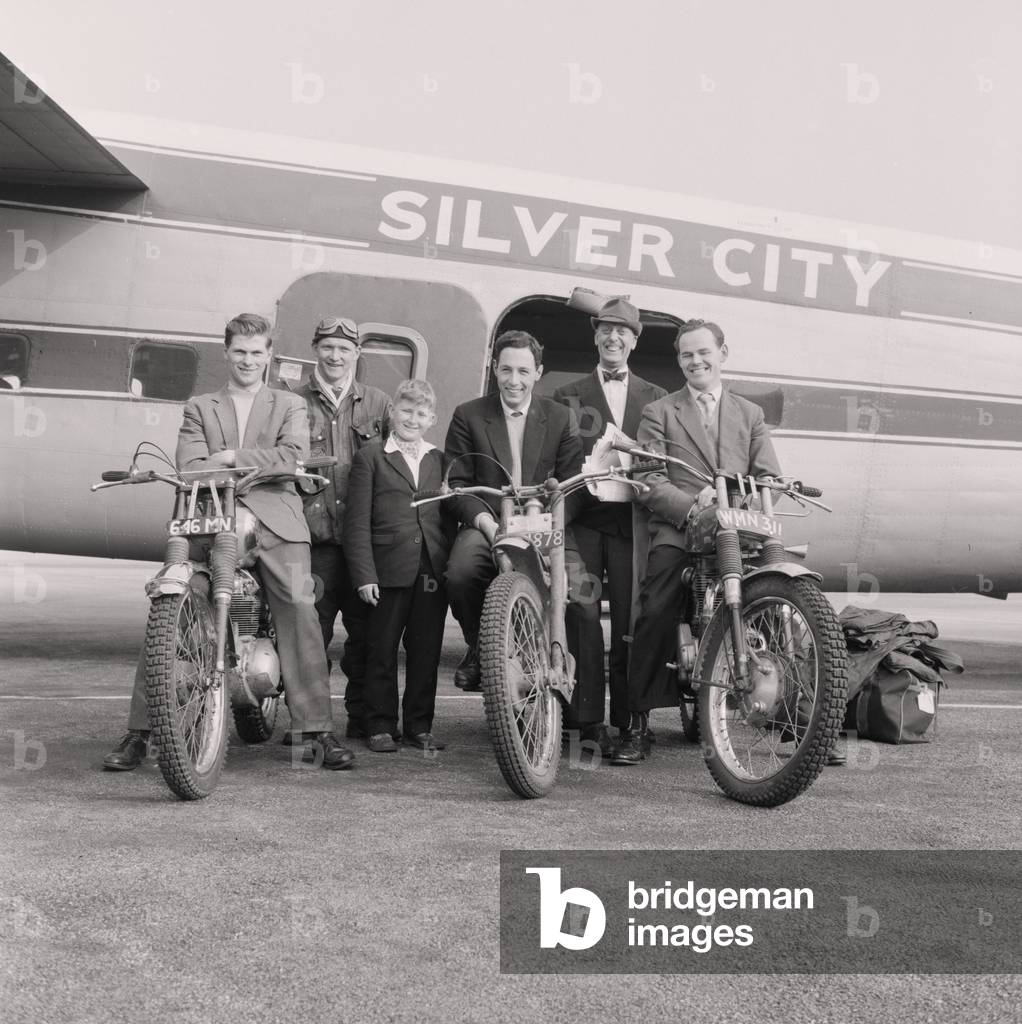 Scottish six day motorcycle trial team, Ronaldsway airport, Isle of Man, May 1960 (b/w photo)