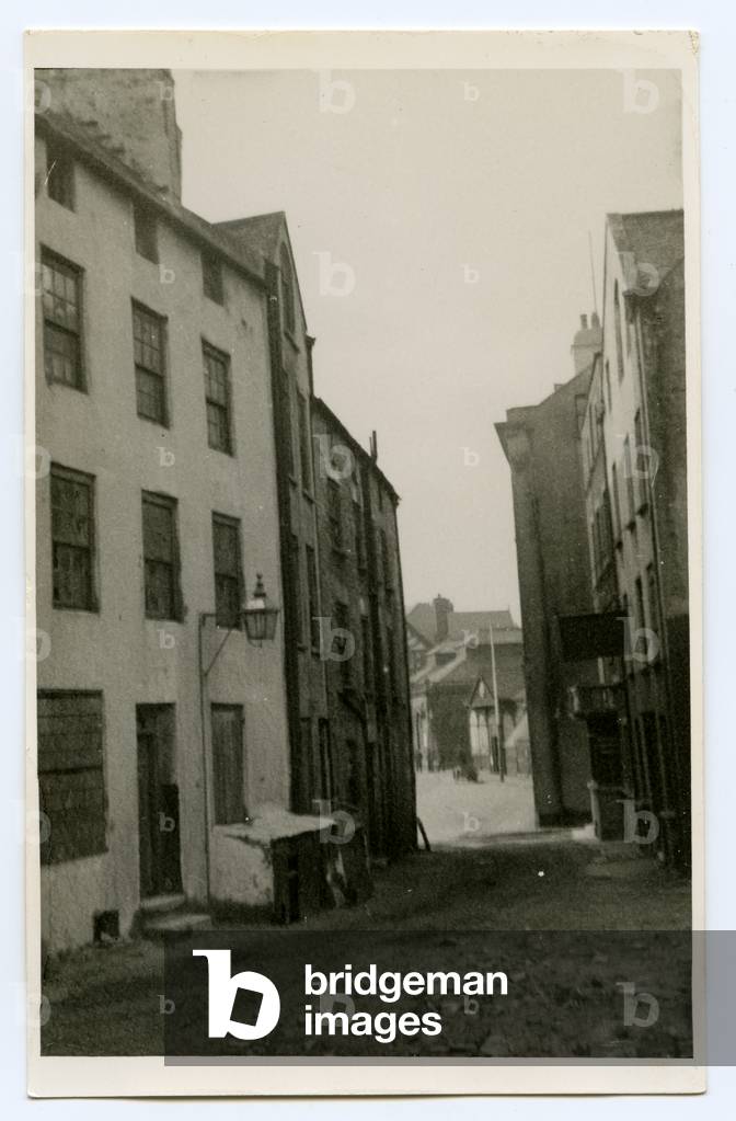 Shadowed lane into Market place, Fairy Ground, Douglas, Isle of Man, 1932-34 (b/w photo)
