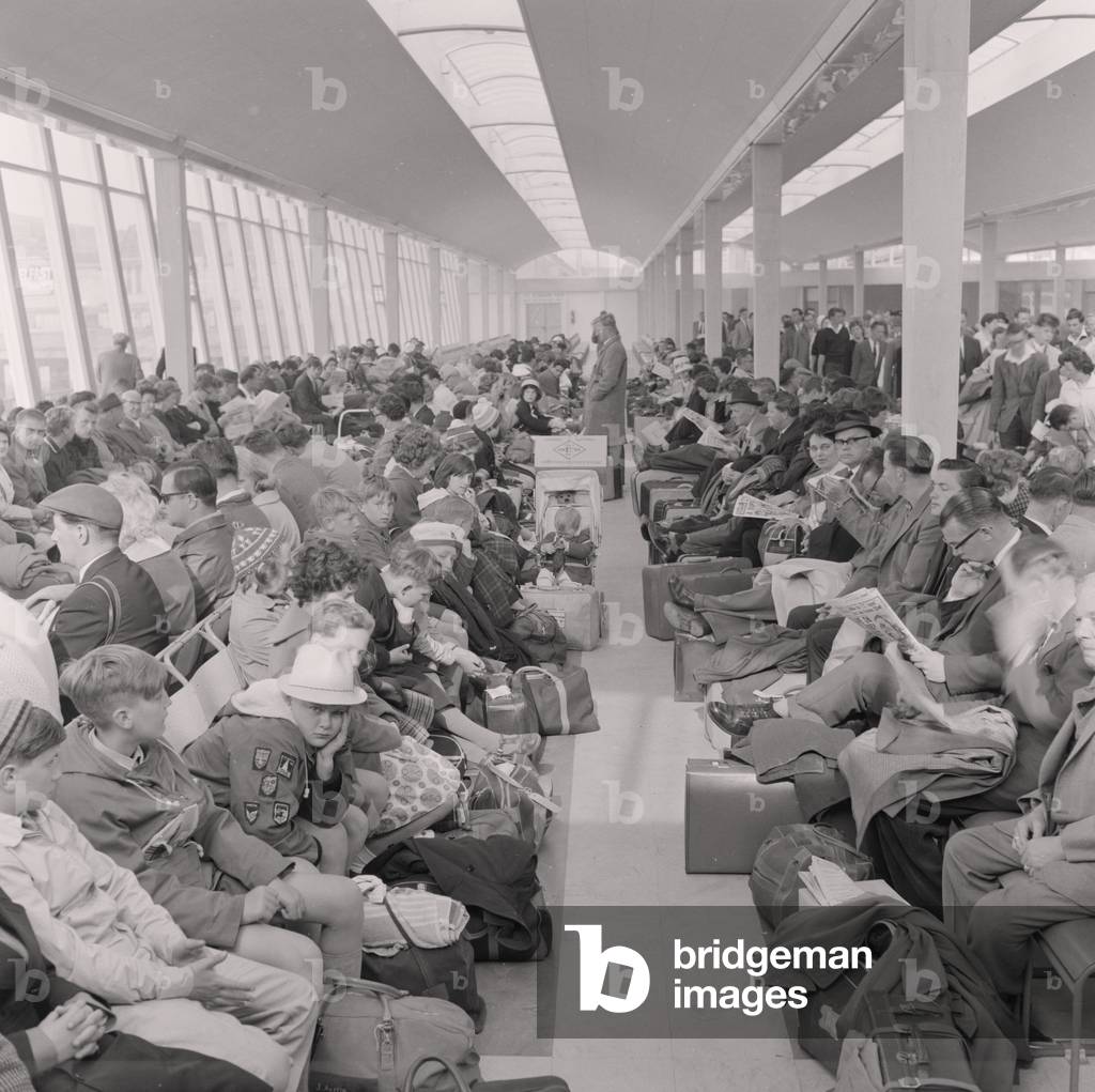 Crowd in Sea Terminal waiting room, June 1962 (b/w photo)