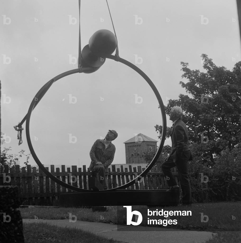 Installation of 'The Watcher' sculpture outside the Manx Museum, September 1977 (b/w photo)