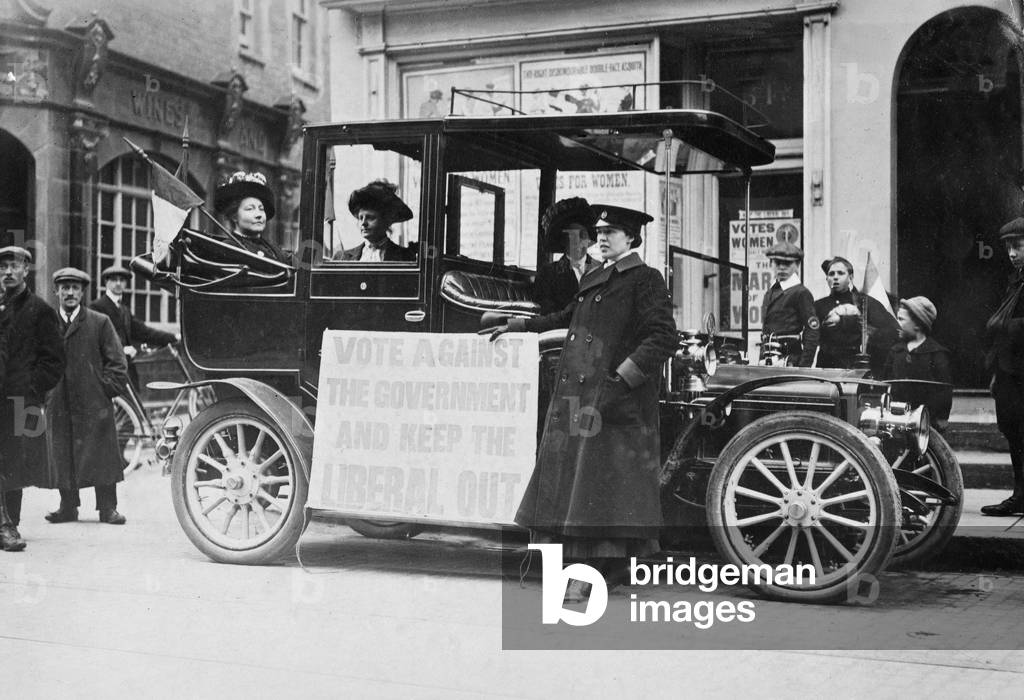 Vera Holme (1881-1969) holding a Suffragette placard, c.1908 (b/w photo)