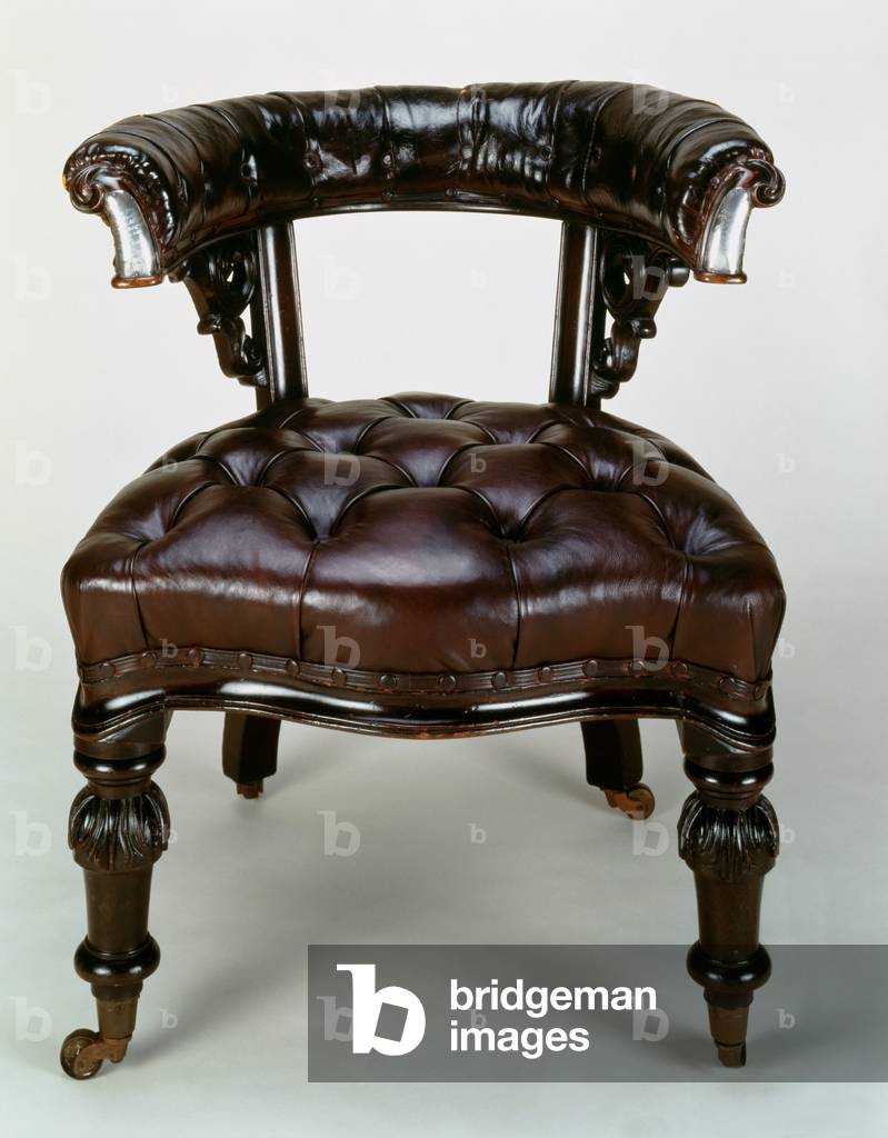 Chair belonging to Charles Dickens (1812-70) (wood and leather)