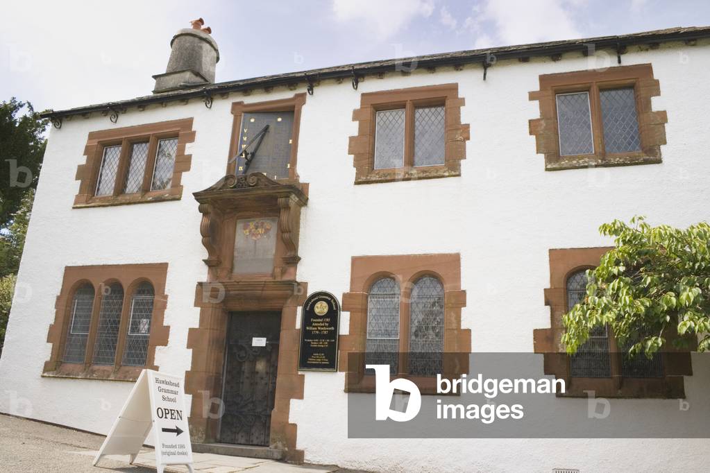 Founded in 1585 William Wordsworth was a scholar here between 1779-1787, Old Grammar School museum, Hawkshead, Cumbria England (photo)