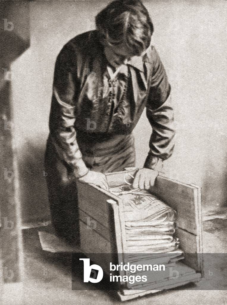 With paper at 9d, per pound, housewives stored old newspapers for re-sale to fishmongers etc during World War One, from The Pageant of the Century, pub.1934