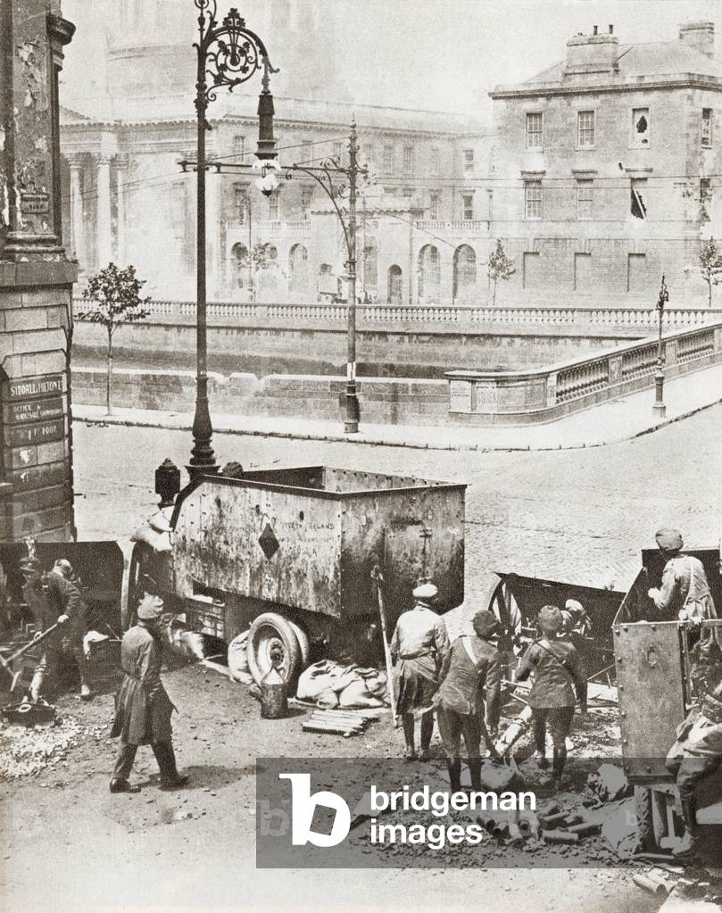 A scene at the Four Courts, Dublin, Ireland during the battle for their possession at the start of the Irish Civil War in 1922. From The Story of 25 Eventful Years in Pictures, published 1935.