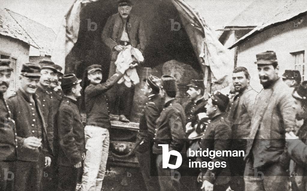 French troops receiving their issue of winter underwear during WWI, from The Pageant of the Century, pub.1934