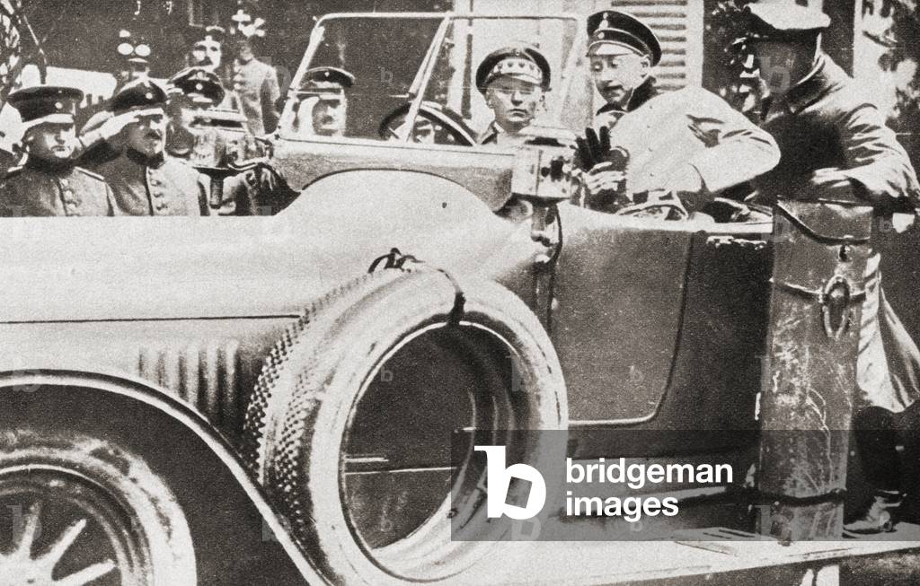 Crown Prince Wilhelm of Germany in his car on a French road occupied by Germans during WWI, from The Pageant of the Century, pub.1934