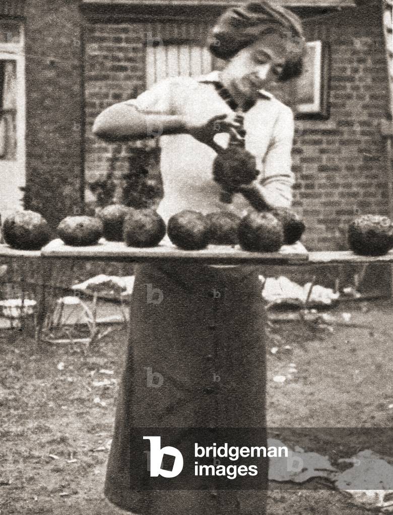 An economy measure used during World War One was the mixing of coal-slack with clay to make an efficient substitute for coal, from The Pageant of the Century, pub.1934