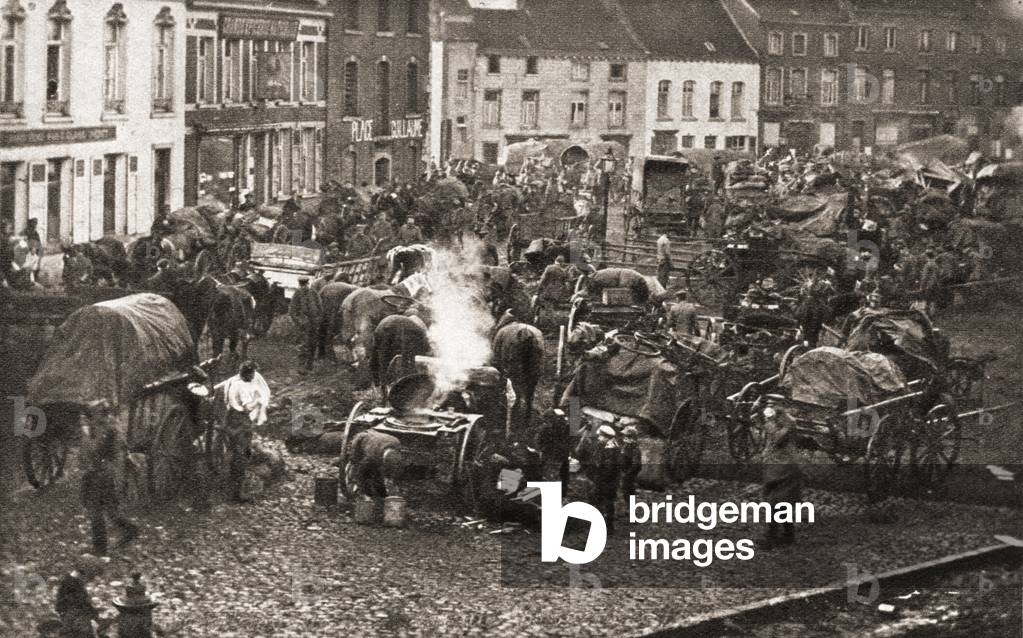 A broken German army stop for food and re-organisation on their retreat through Belgium at the end of World War One, from The Pageant of the Century, pub.1934