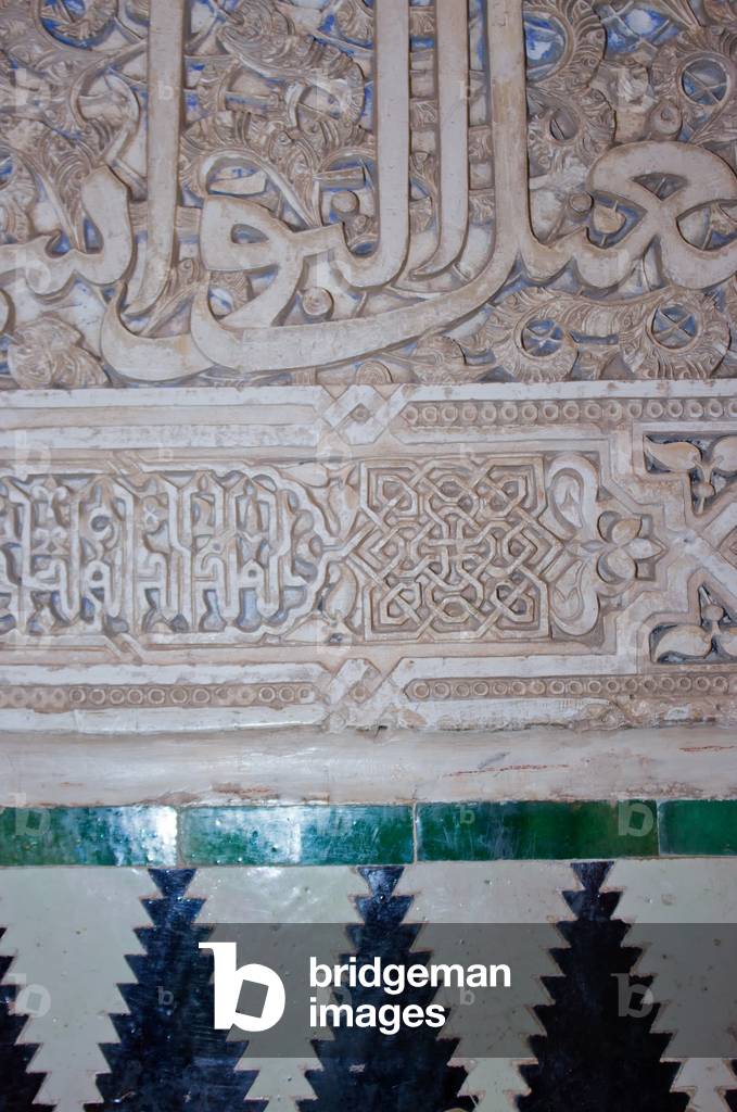 Detail of intricately carved wall and tiles, Alhambra Palace, Granada, Andalucia, Spain (photo)