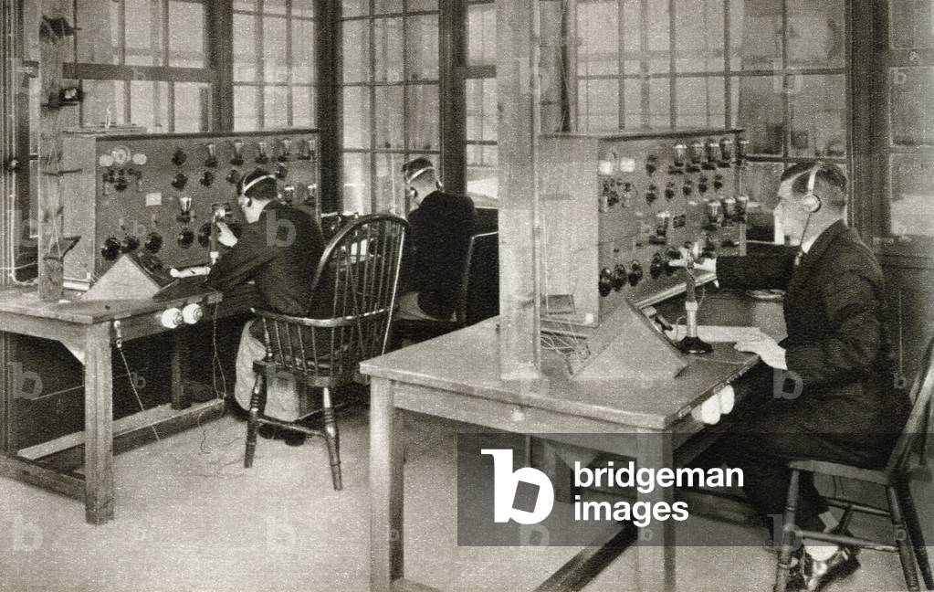 The wireless transmission room at Croydon Aerodrome, London, England which was re-opened in 1928.  From The Story of 25 Eventful Years in Pictures published 1935