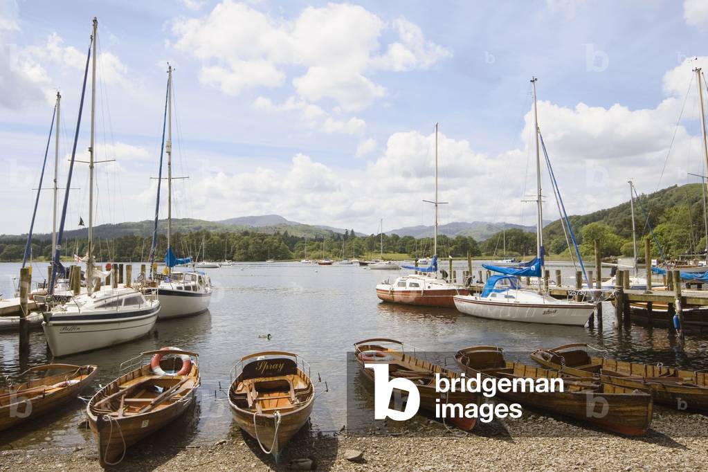 Rowing boats for hire on the shore of Lake Windermere, Cumbria, England (photo)