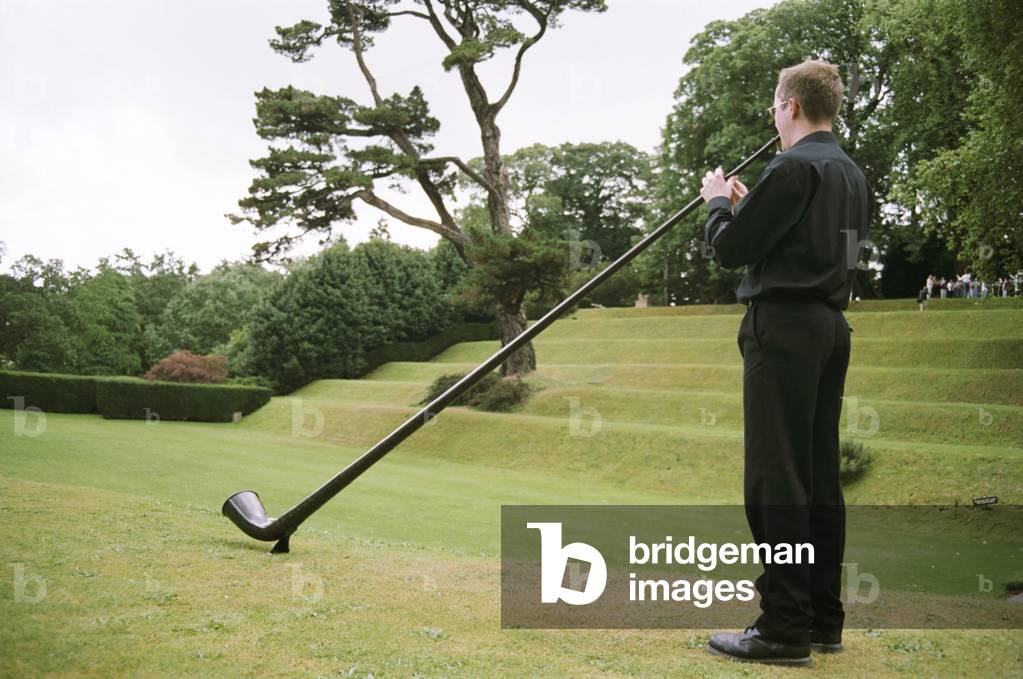 Alphorn being played outdoors