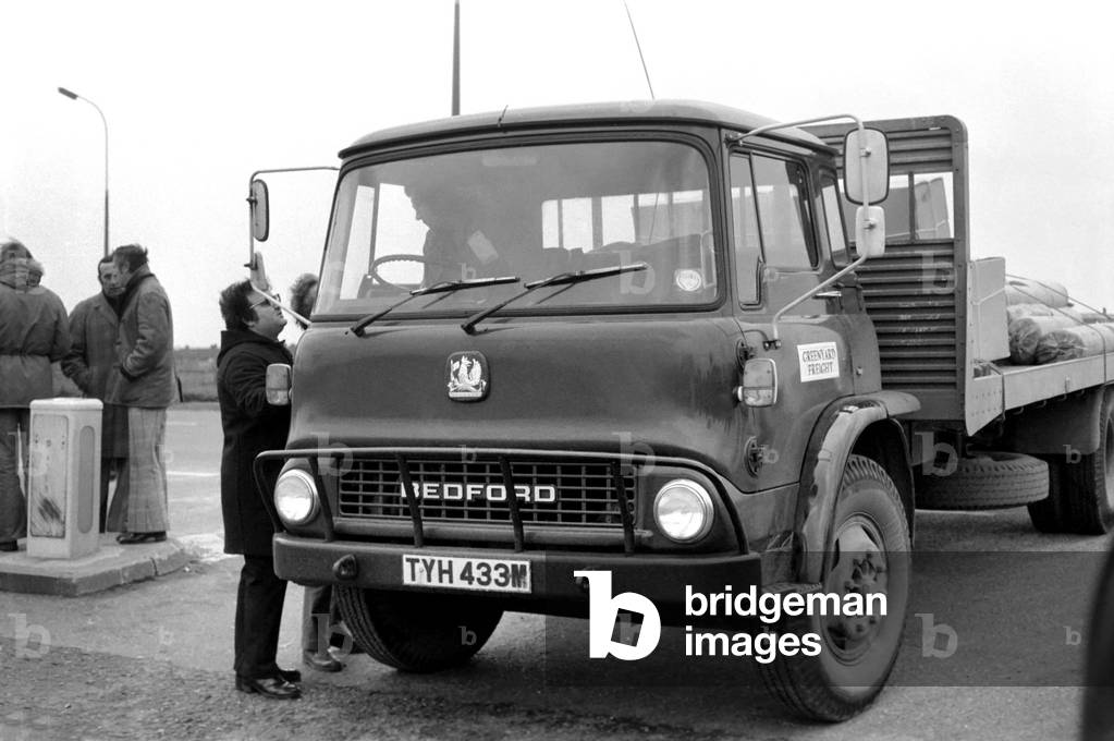 Hundreds of Dockers gathered outside Dagenham Storage Company, March 1975 (b/w photo)