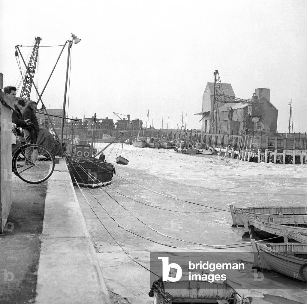 Pictures of the sea at Whitstable, Kent, frozen solid in places. 14th January 1963 (b/w photo)