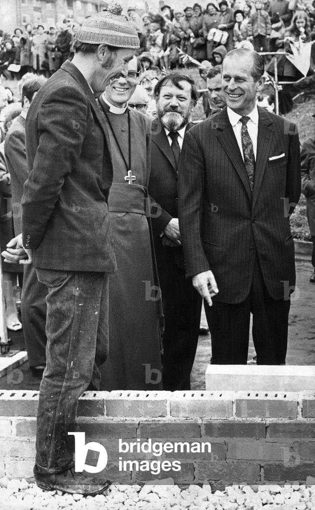 Prince Philip, Duke of Edinburgh, shares a joke with a workman after the Prince laid the foundation stone at St Peter's Church, Monkwearmouth during a visit to Sunderland, 
31/05/1973