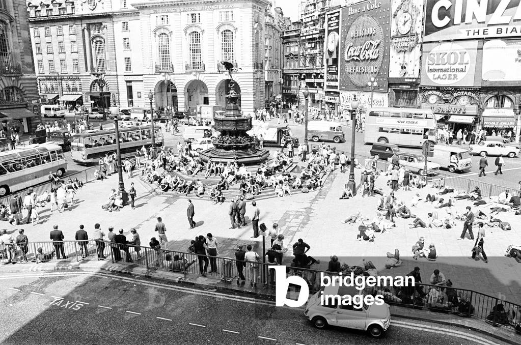 Tourists in Piccadilly, London, 10th August 1969 (b/w photo)