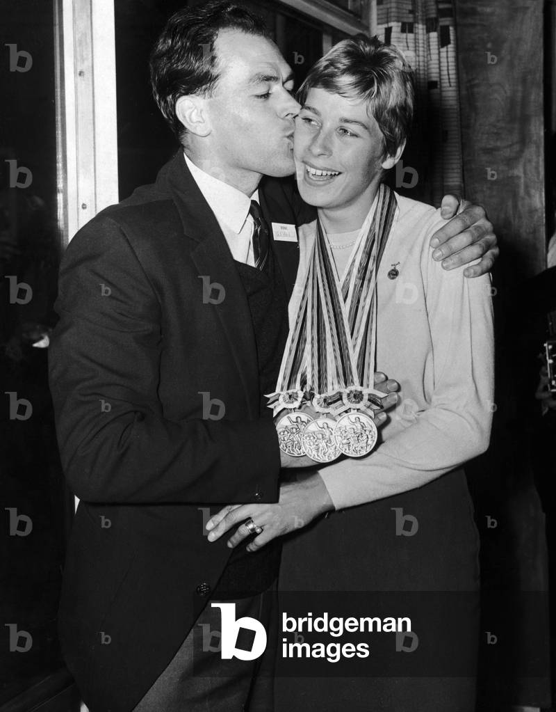 Tokyo Gold Medalist Mary Rand is met by her husband Sid on her return from the Olympic Games. 20th October 1964