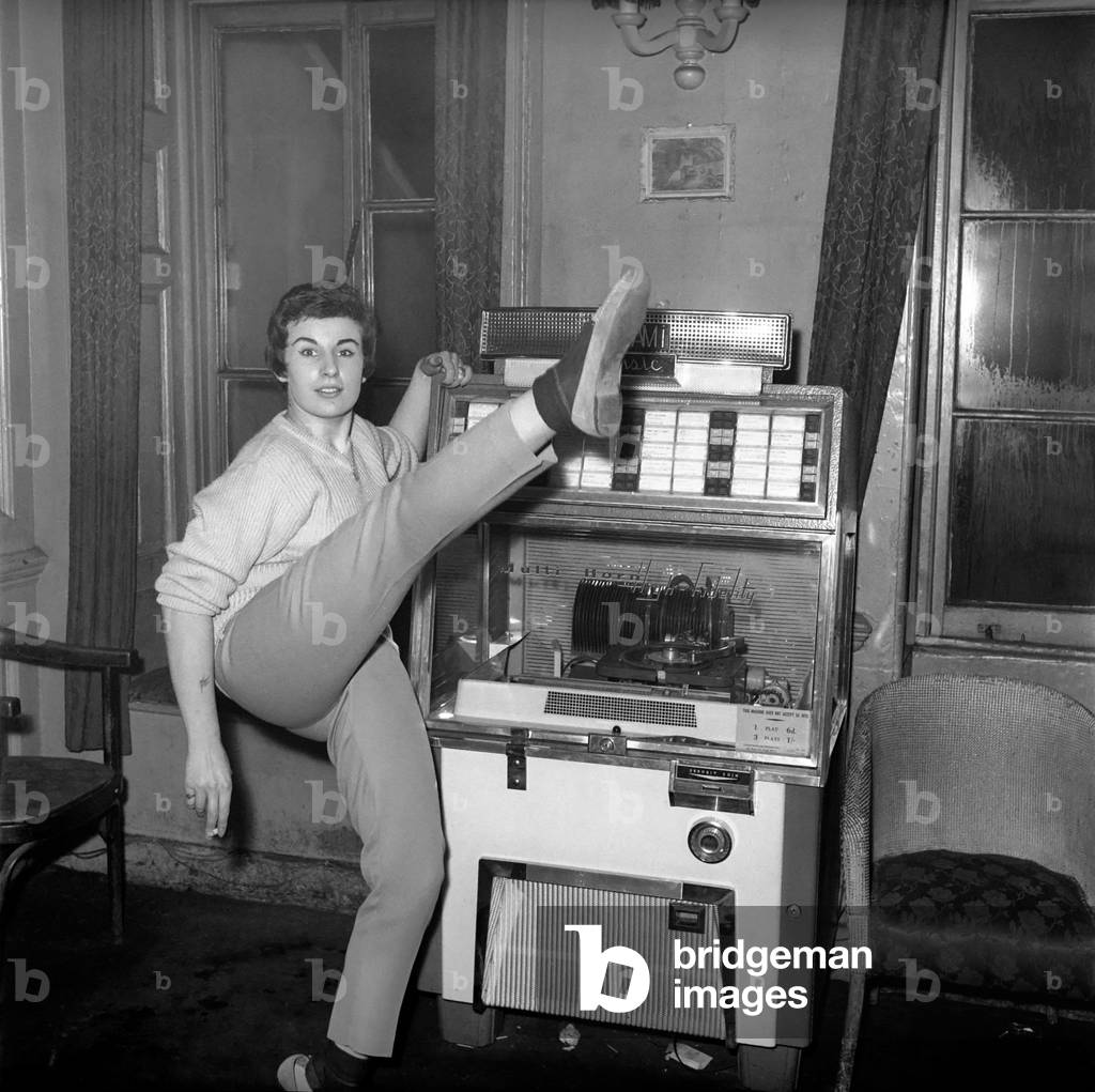 Woman selected tracks from juke box. 1960
